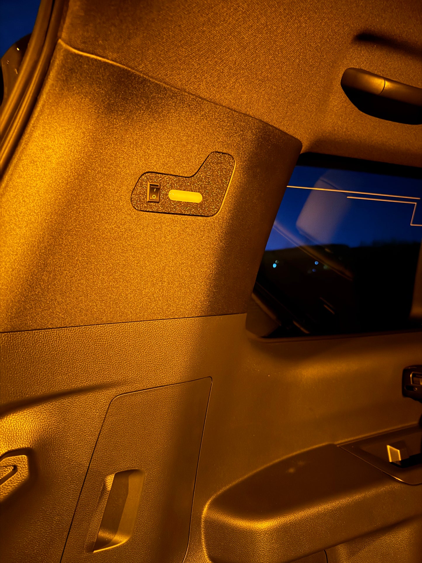 A black cargo area light designed for 2024+Up Land Cruiser LC250/GX550 with a built-in on/off switch.