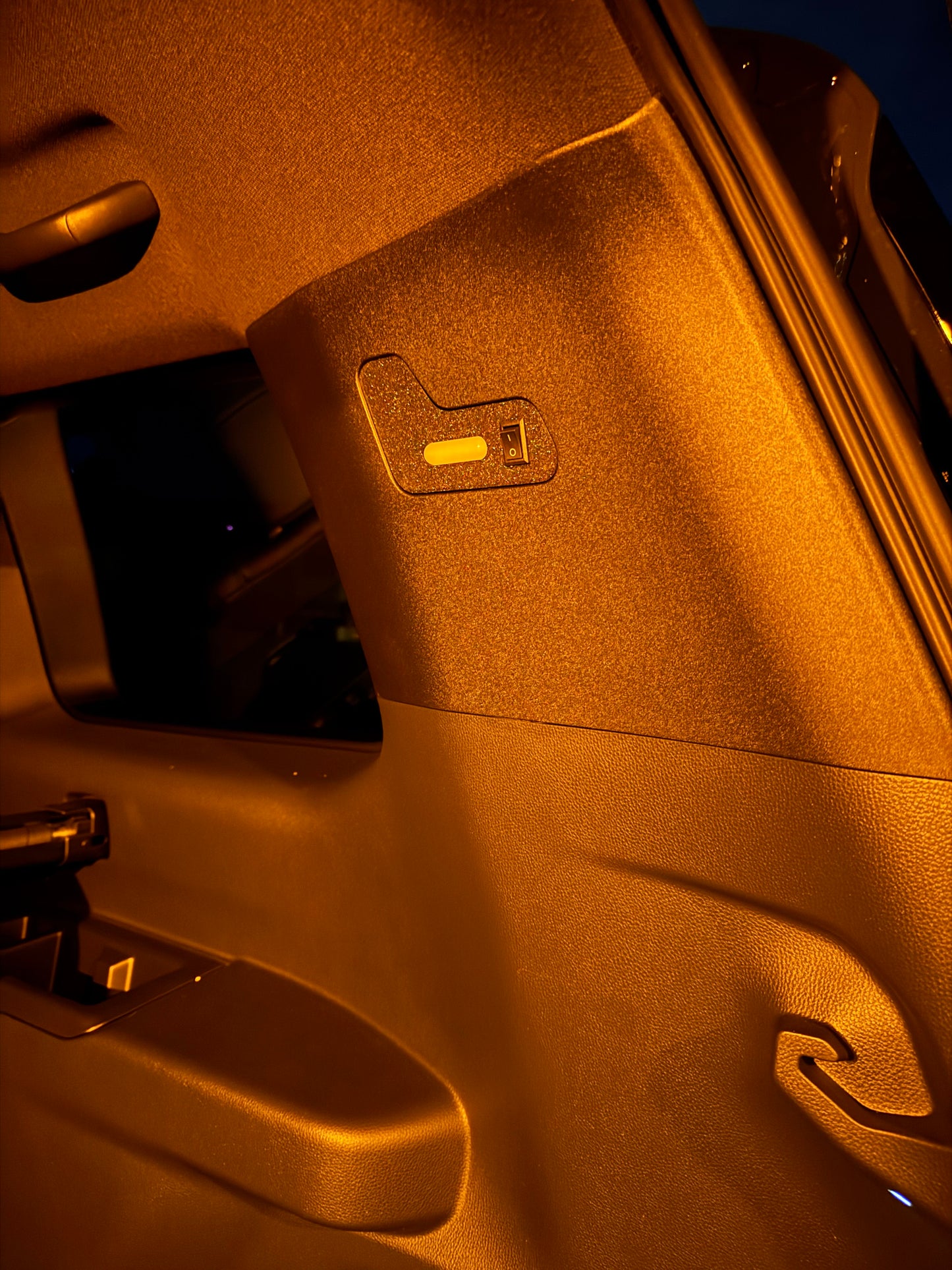 A black cargo area light designed for 2024+Up Land Cruiser LC250/GX550 with a built-in on/off switch.