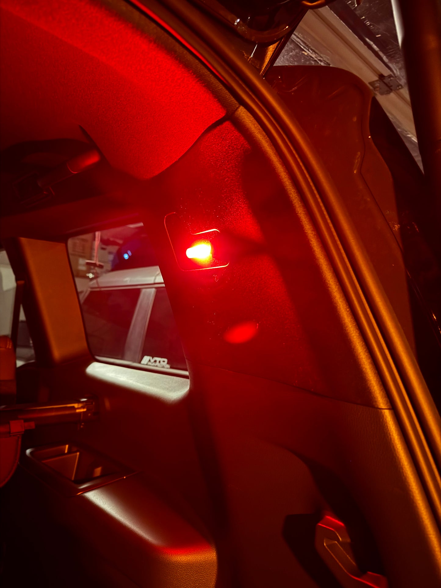 A black cargo area light designed for 2024+Up Land Cruiser LC250/GX550 with a built-in on/off switch.