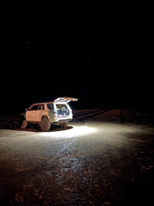 A 4Runner vehicle with hatch light pods installed, providing illumination during nighttime or low-light conditions.