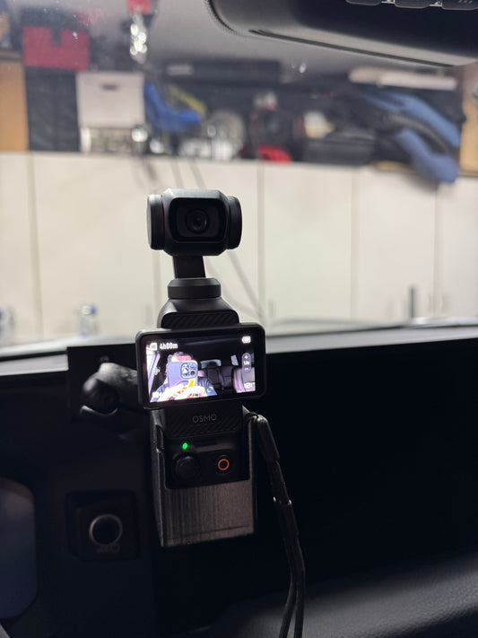 DJI Osmo 3 Camera attached to an Obisan3d mount inside a car