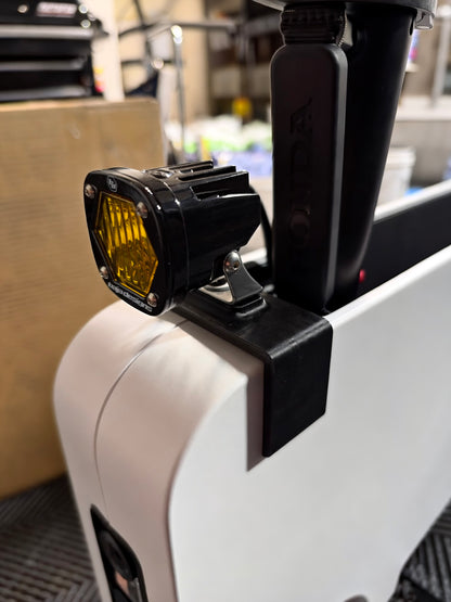 Side view of Baja Designs LED auxiliary light mounted to Obisan3D universal accessory bracket on Honda Motocompacto.