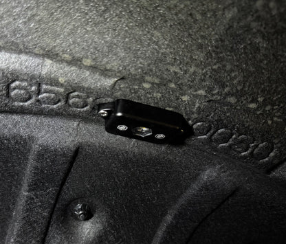 Close-up of a Baja Designs Rock light mounted on a Toyota Land Cruiser.