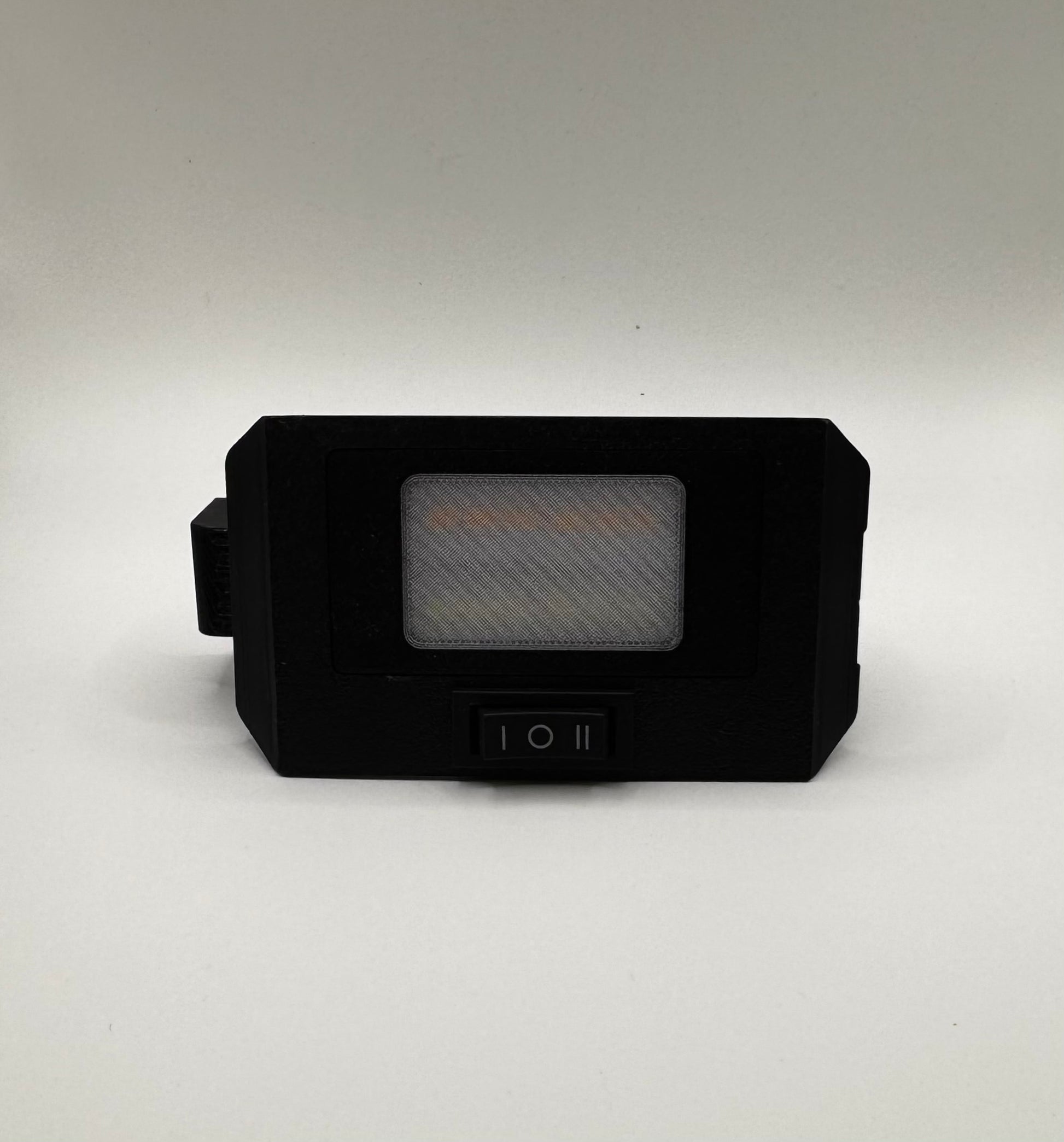 A black switchable LED hatch light upgrade for 4Runner with a switch