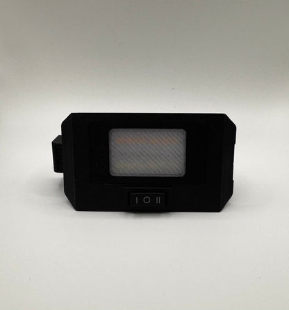A black switchable LED hatch light upgrade for 4Runner with a switch