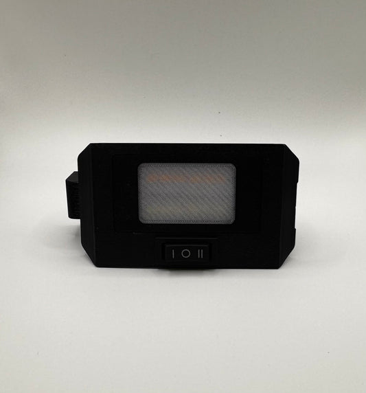 A black switchable LED hatch light upgrade for 4Runner with a switch