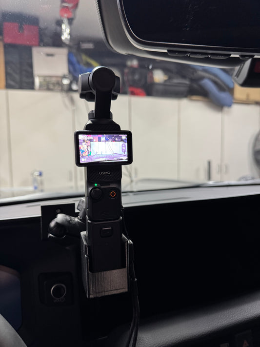 DJI Osmo 3 Camera attached to an Obisan3d mount inside a car 